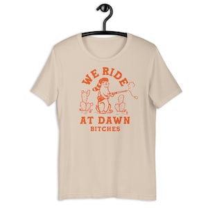 We rijden bij Dawn Bitches: grappige prairiehond met cap gun unisex T-shirt met korte mouwen