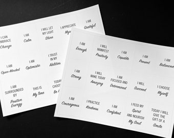 May include: Two sheets of white paper with black text printed on them. The text is in the form of affirmations, such as "I am calm", "I am open-minded", "I am strong", "I am courageous", "I am confident", and "I am present".