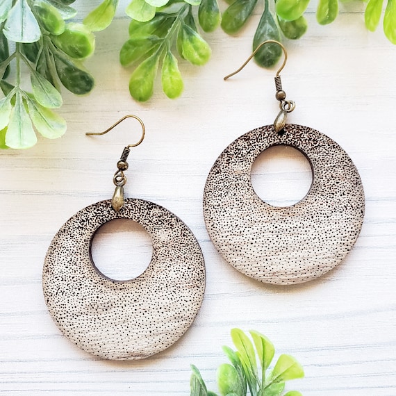 Laser clearance engraved earrings