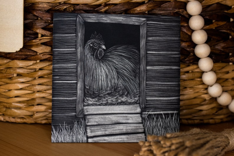 May include: A black and white drawing of a rooster in a coop. The rooster is facing to the left and has a large, fluffy tail. The coop is made of wood and has a small door. The drawing is done in a realistic style.