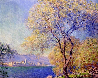 May include: A painting of a landscape with a large tree in the foreground. The tree has yellow and blue leaves and is in front of a body of water. In the distance, there is a town with buildings and a mountain range.