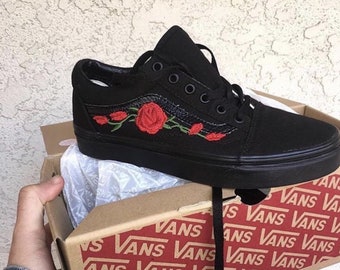 black vans with a rose