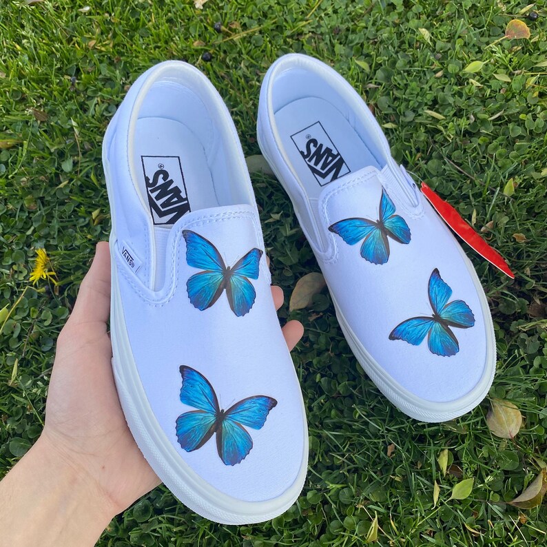 blue butterfly slip on vans