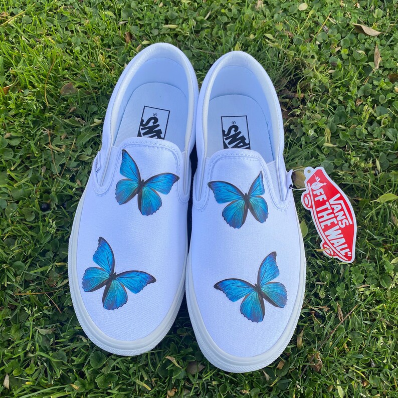 blue butterfly slip on vans