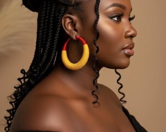 FULANI YARN EARRING: Extra- large 100 percent handmade Fulani yarn earring, made to honor the west African Sahara Fulani’s tribe artistry.