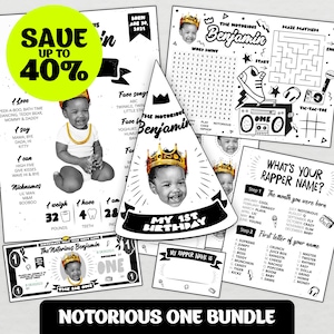 May include: A printable set of black and white party printables for a first birthday party. The printables feature a crown, a birthday hat, a word search, a maze, a tic-tac-toe game, and a "What's Your Rapper Name?" game. The printables are decorated with a black and white illustration of a microphone, a boombox, and a trainer. The text "The Notorious Benjamin" is featured on the printables.