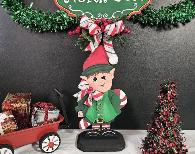 Festive Elf Decoration with North Pole Sign – A Touch of Holiday Magic!