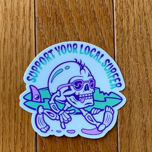 Support your local surfer sticker - pier wipe out skull - trending stickers for your lab top hydro flask or coolers Indonesia volcano surf