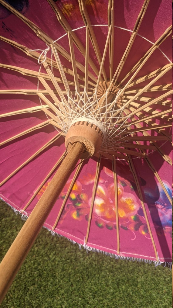 Compact pink parasol with tassels and brightly pa… - image 8