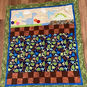 Handmade Dinosaur Baby Quilt: Fleece Backed Child&#39;s Quilt