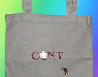 Nueva bolsa de mano de punto de cruz hecha a mano "C*nt" para proyectos de crochet de hilo blanco.