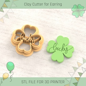 以下が含まれることがあります： 「lucky」という言葉が刻まれた四つ葉のクローバーの形をした3Dプリントされた粘土カッター。イヤリングを作るためのカッターです。3Dプリンター用のSTLファイルです。