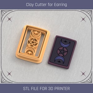 May include: A 3D printed clay cutter for earrings, featuring a triple moon and pentagram design. The cutter is made of a light brown plastic and is ready to be used for crafting.