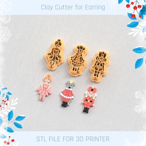 Op de afbeelding: Kleisnijders voor oorbellen in de vorm van een ballerina, muis en notenkraker. De afbeelding toont ook kleisnijders in de vorm van een ballerina, muis en notenkraker. De tekst "Clay Cutter for Earring" en "STL FILE FOR 3D PRINTER" zijn zichtbaar.