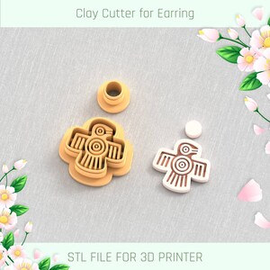 May include: A 3D printed clay cutter for earrings, shaped like a stylized bird with geometric patterns. The cutter is shown in two parts, with the top part removed to show the detail. The text "STL FILE FOR 3D PRINTER" is visible at the bottom of the image.
