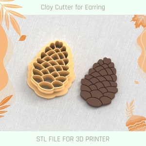 May include: A 3D printed clay cutter for earrings in the shape of a pine cone. The cutter is beige and the pine cone is brown. STL FILE FOR 3D PRINTER.