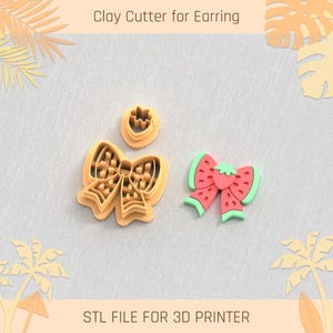 May include: Clay cutters for earrings, including a bow and a watermelon slice design. The bow cutter is light orange, and the watermelon slice is red with green and light green accents. The text "Clay Cutter for Earring" and "STL FILE FOR 3D PRINTER" are visible.