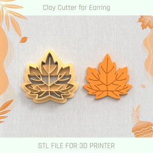 May include: A 3D printed clay cutter for earrings in the shape of a maple leaf. The cutter is made of brown plastic and has a detailed design. STL FILE FOR 3D PRINTER.