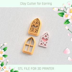May include: Three clay cutters for earrings. Two are tan and one is pink. The tan cutters are shaped like arched windows with heart cutouts. The pink cutter has a heart and geometric design. Text at the top says "Clay Cutter for Earring".