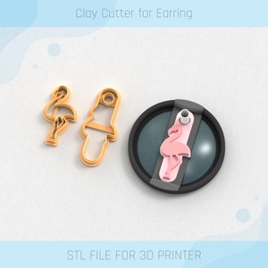 May include: A 3D printed clay cutter for earrings, featuring a flamingo design. The cutter comes in two pieces, one for the flamingo shape and one for the earring post. The cutter is designed to be used with polymer clay.