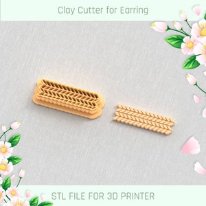 Puede incluir: Un cortador de arcilla para pendientes, impreso en 3D, con un patrón de espiga. El cortador está hecho de plástico marrón claro y está diseñado para ser utilizado con arcilla polimérica. ARCHIVO STL PARA IMPRESORA 3D.
