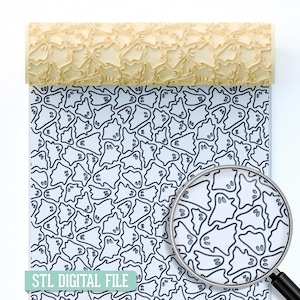 May include: A light beige rolling pin with a ghost pattern is shown above a sheet with a repeating black and white ghost design. A magnifying glass is focused on the ghost pattern. The text "STL DIGITAL FILE" is at the bottom.