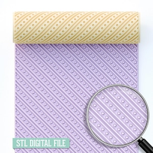 May include: A light beige rolling pin with a diagonal dotted pattern rests on a lavender surface with a matching pattern. The text "STL DIGITAL FILE" is at the bottom. A magnifying glass is in the lower right corner.