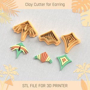 May include: Set of six 3D printed clay cutters for earrings. The cutters are in the shape of a palm tree, a diamond, a fan, and a geometric design. The cutters are orange, green, and yellow.