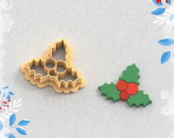 May include: A 3D printed clay cutter for earrings in the shape of a holly leaf with red berries. STL FILE FOR 3D PRINTER.