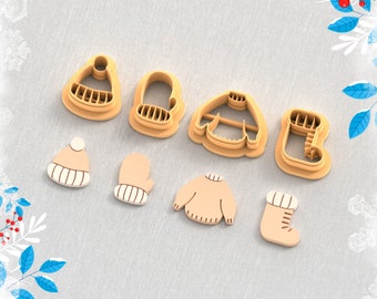 May include: Six 3D printed cookie cutters for making winter-themed cookies. The cutters are shaped like a hat, mitten, sweater, and boot.  STL FILE FOR 3D PRINTER.