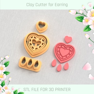 May include: A set of 3D printable clay cutters for earrings. The set includes a heart-shaped cutter with a detailed design, a smaller heart cutter, and three teardrop-shaped cutters. The cutters are shown on a light beige surface. STL FILE FOR 3D PRINTER