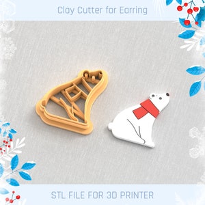 May include: Two 3D printed clay cutters for earrings, one shaped like a polar bear wearing a red scarf and the other shaped like a bell. The text "STL FILE FOR 3D PRINTER" is printed below the cutters.