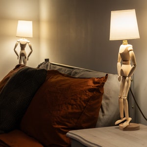 Handcrafted Wooden Mannequin Table Lamp with Luxurious Silk Lampshade - Artisan Sculptural Decor for Home or Office - Unique Boho Lighting Accent. 
Man cave lamp, Dorm light, Christmas Gift
Housewarming Gift
Desk Light, Unusual Gift, Table lamp