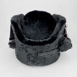 Small black dog carrier bag with round cushion