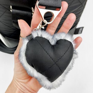 Black heart shaped pendant with faux fur