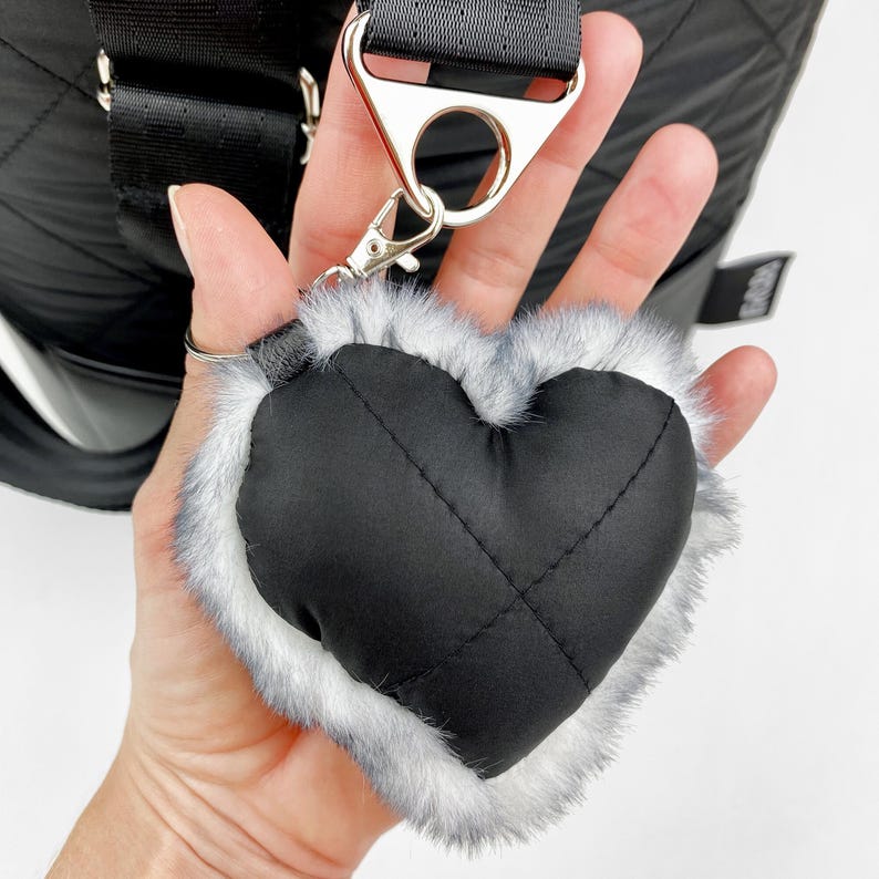 Black heart shaped pendant with faux fur