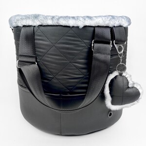 Luxury black dog carrier tote bag from water repellent quilted fabric and vegan leather with fluffy gray faux fur lining