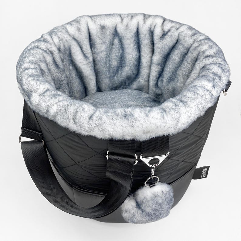 Round 2 in 1 dog carrier bag and bed from black quilted fabric with soft gray faux fur lining and length adjustable shoulder straps
