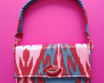 Traditional Ikat silk bag and vintage costume jewelry and handmade pearls in a unique piece created in France