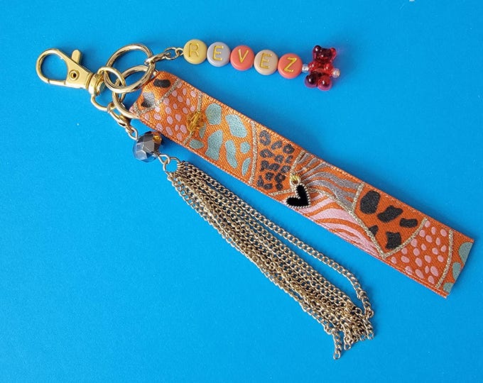 Couture style bag jewel in fancy beads and message beads and teddy bear and ribbon original handcrafted creation in unique piece in France