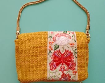 Mini handmade designer fabric bag, a unique piece from a French luxury designer