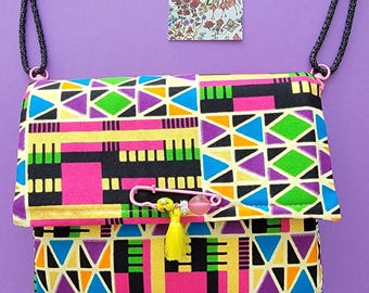 Handmade mini multicolored wax print bag, a unique, handcrafted, and original creation from France.