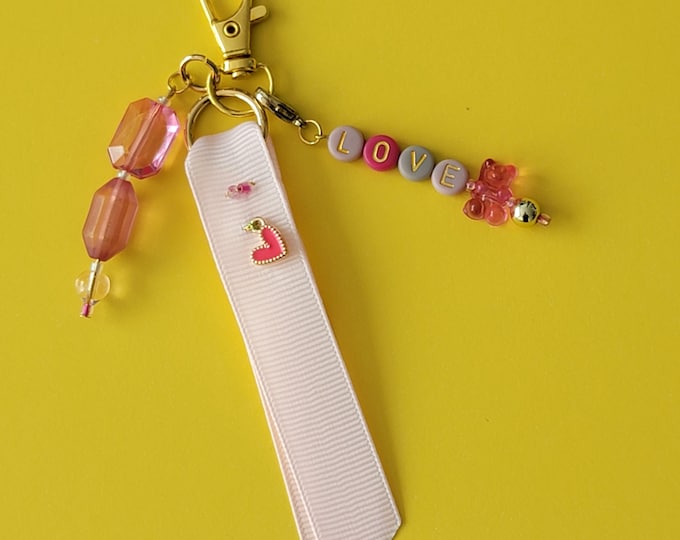 Bag jewel with fancy beads and golden letter beads, love, teddy bear bead and heart charms, original handcrafted creation made in France