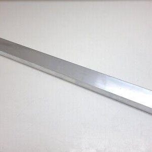 May include: A long, silver, rectangular metal bar.