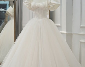 Customized dress for bride with crystal on bodice
