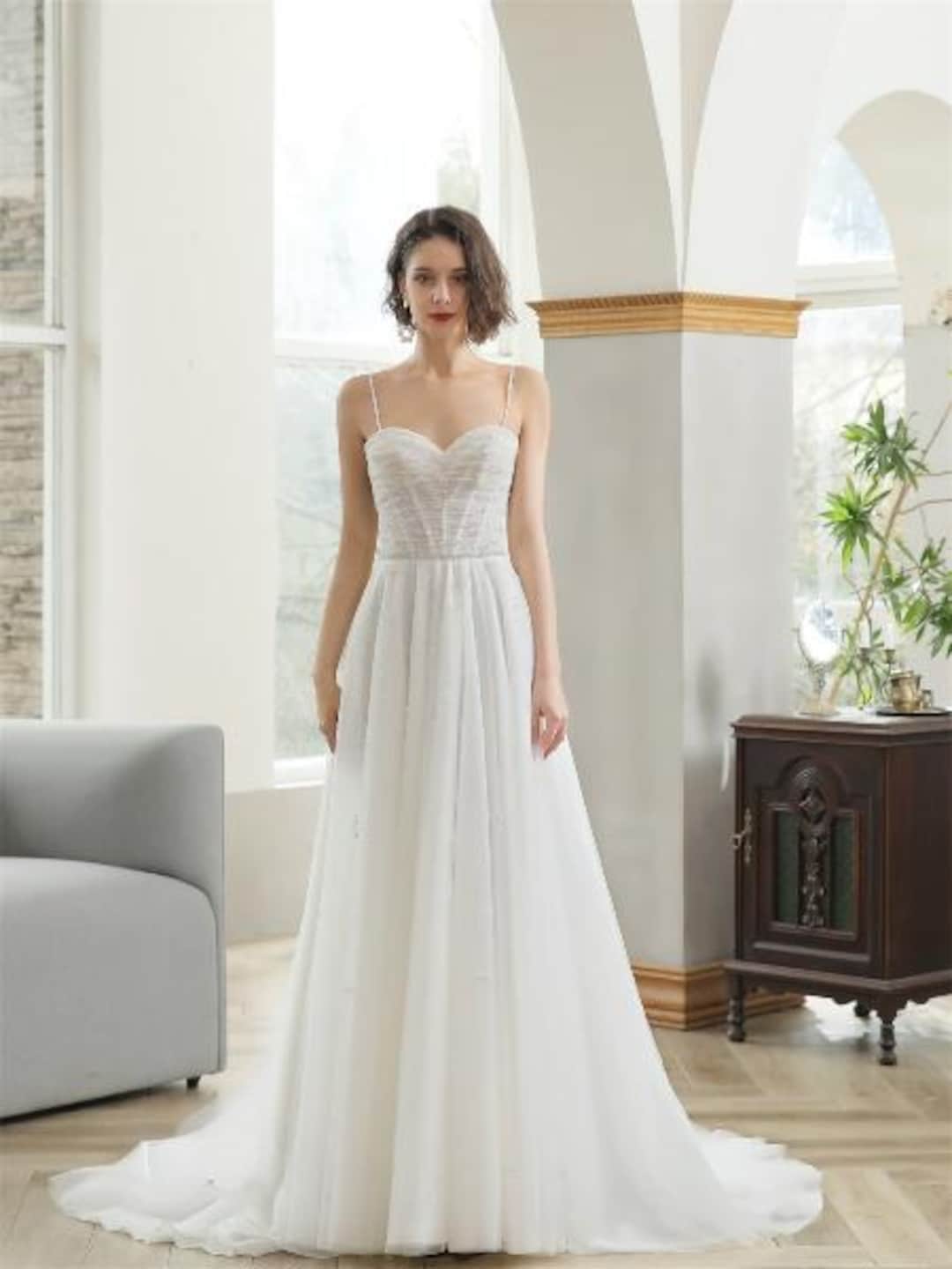 beaded spaghetti strap wedding dresses Chic White Mermaid Spaghetti Straps V-Neck Sleeveless Lace Beaded Tulle Chapel Train Wedding Dress With Appliques main image 1