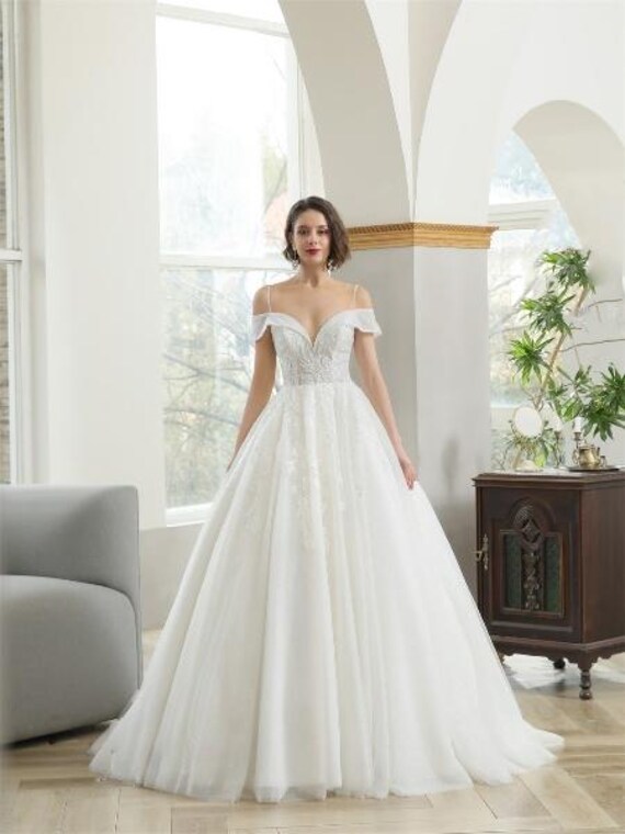open lace back dress AmazingOff The Shoulder Long Sleevess Lace Princess Plus Size Wedding Dress