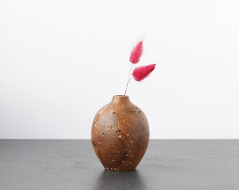 Rustic vase made of apple wood for dried flowers