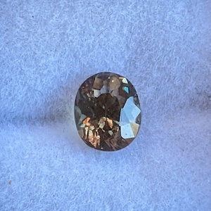 Color Change Pyrope &quot;Dragon&quot; Garnet from Kenya, Yellow/Green/Red Shift, SLIGHTLY INCLUDED, UV Reactive, Oval Cut, 5.6 x 4.6mm, .75ct
