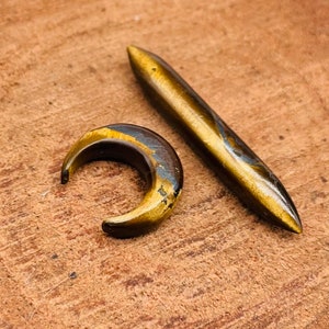 2 Pieces of Natural TIGER EYE stone one Septum and one Tusk. Nose pincher,Handmade Beautiful Jewels.Size:-(12g) 2mm to 10mm & Customise